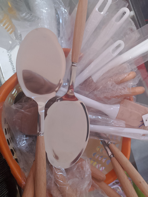 کفگیراستیل دسته چوبی